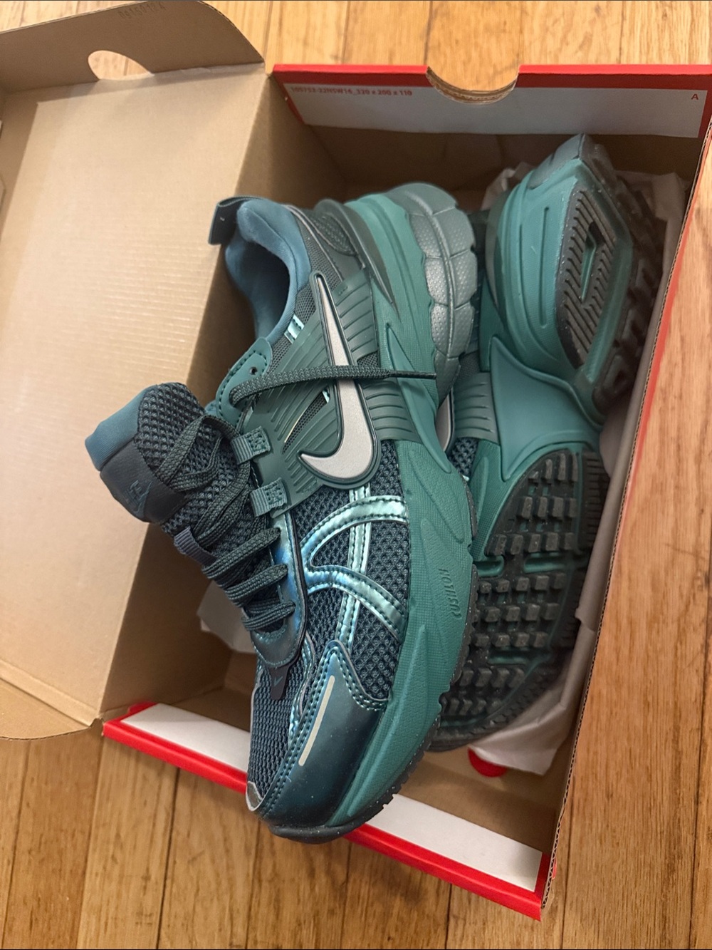 Woman’s NIKE V2K Run sneaker- Bicoastal metallic silver